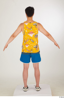  Lan a poses blue shorts dressed sports standing white sneakers whole body yellow printed tank top 0005.jpg